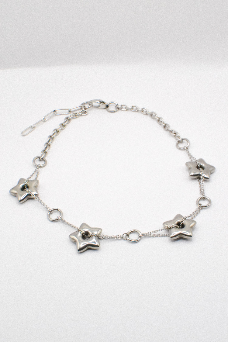 Photo du bijoux :  Collier Ras de Cou Étoiles Argentées #6