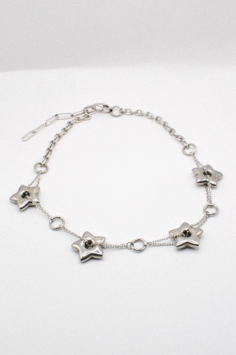 Photo du bijoux :  Collier Ras de Cou Étoiles Argentées #6